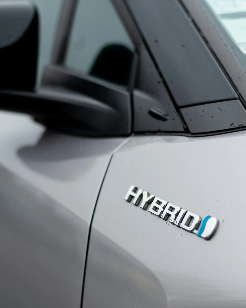 Hybrid car at a charging point